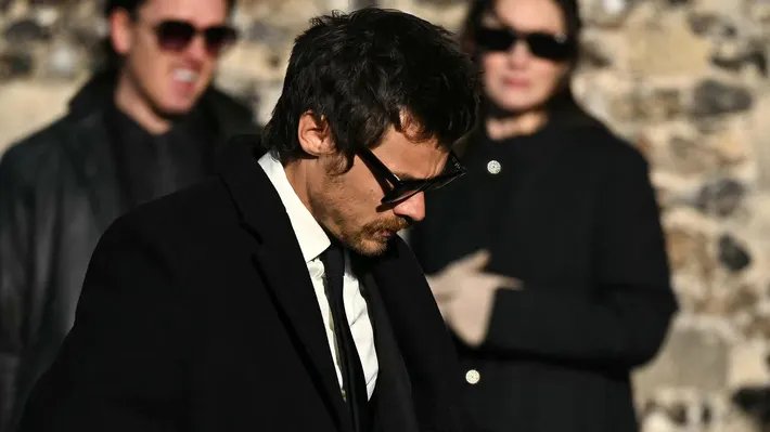 Former One Direction band member Harry Styles attends Payne's funeral. (Photo by JUSTIN TALLIS/AFP via Getty Images)